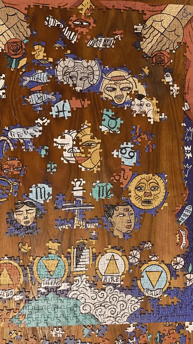 Timelapse of a hand putting together a puzzle showing bold Latin art themes and astrological symbols. Against a dark wooden table.