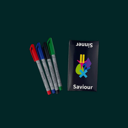 A boxed set of the educational game Sinner or Saviour sits on a dark green background, along with four dry erase markers used for the scorecards.