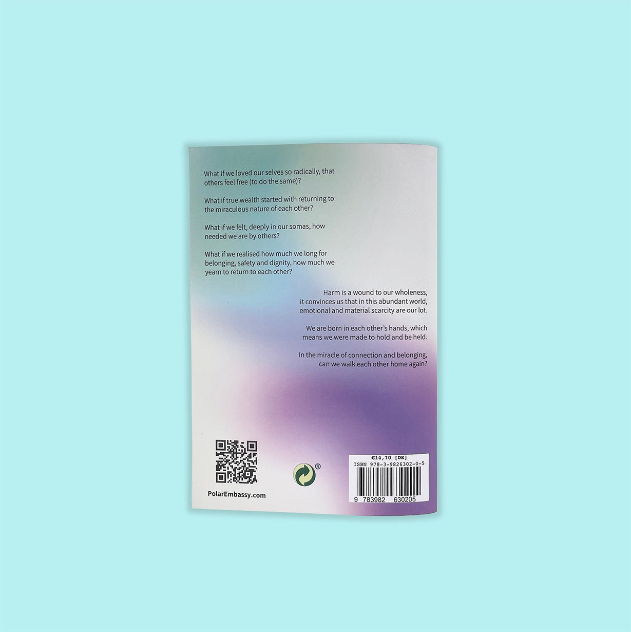 Workbook from Polar Embassy on queer relationships and healing trauma, against a light blue background.