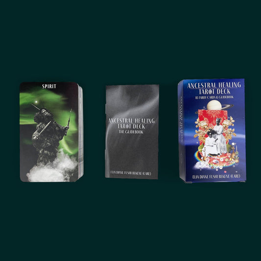 Against a dark green background there is a deck of Tarot cards with the SPIRIT card on top, on the left. The Spirit is holding two swords, on a cloud of smoke, and in front of green aurora. In the middle is a black and white booklet, and on the right is a bright dark blue box with an image of a person doing a child's hair. The child is seated. The deck is titled "Ancestral Healing Tarot Deck, 83 Tarot Cards & Guidebook by Elia Diane Fushi Bekene (Care). 